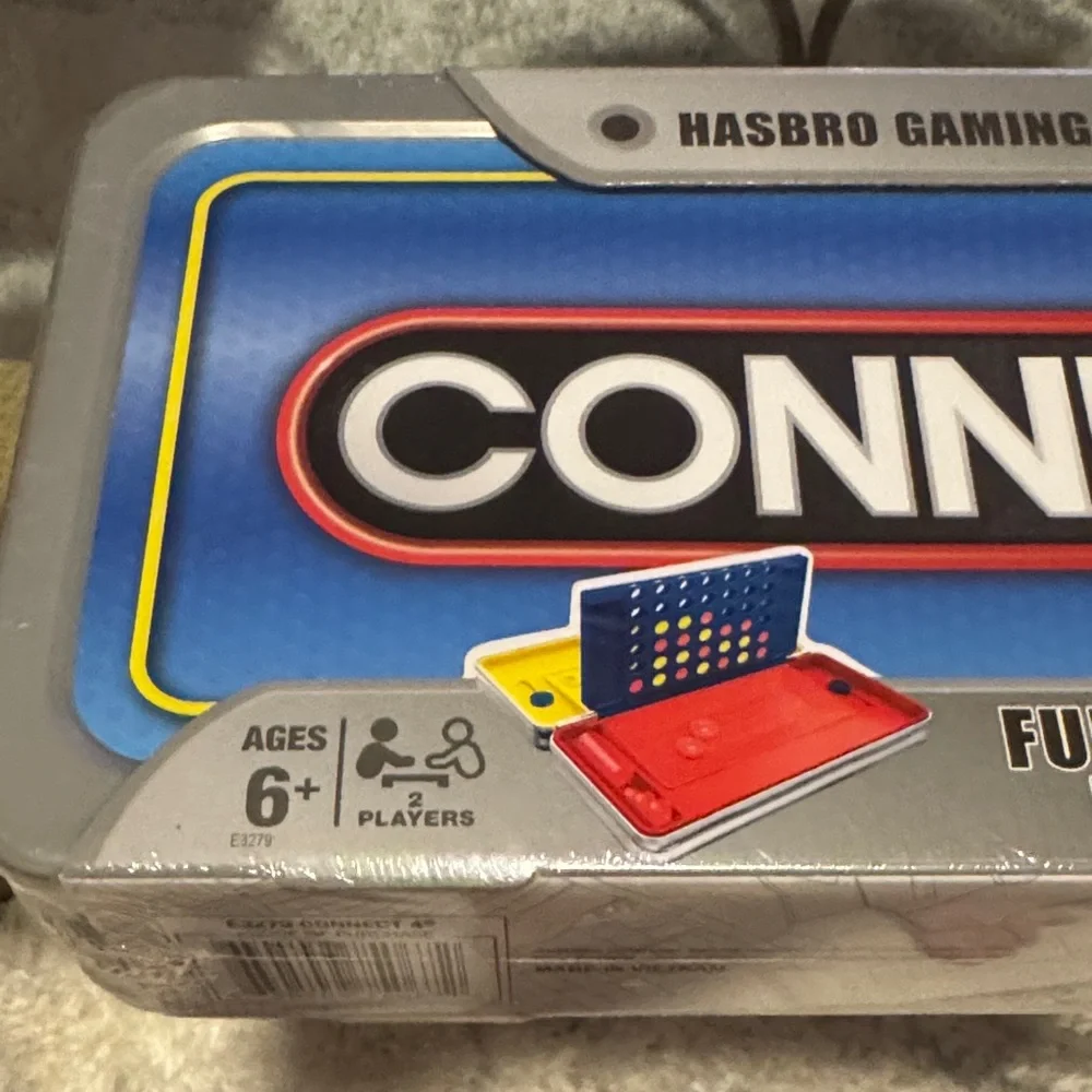 Hasbro Gaming Road Trip Connect 4 Portable Game Tin in Blue and Silver